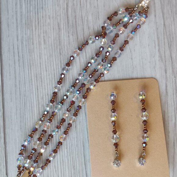An Austrian crystal 4 strand beaded bracelet with matching earrings. - Picture 1 of 4